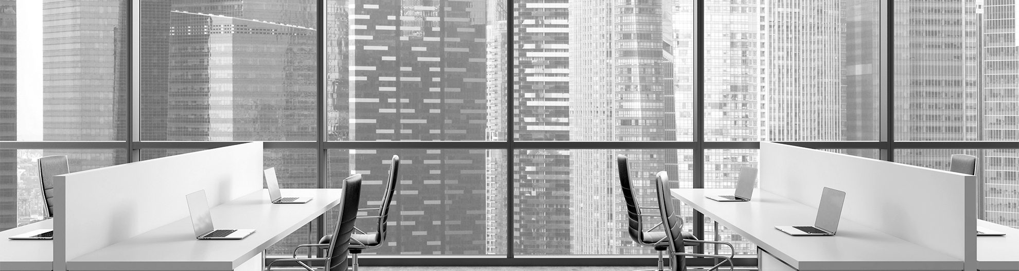 Empty office building with skyscrapers outside